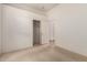 Carpeted bedroom featuring a walk-in closet at 710 W Cherrywood Dr, Chandler, AZ 85248