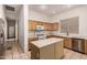 Functional kitchen with island, cabinets, and appliances, ready for your personal touch at 710 W Cherrywood Dr, Chandler, AZ 85248