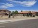 Single Gathering homes featuring desert landscaping in a community with well-maintained streets at 7724 W Topeka W Dr, Glendale, AZ 85308