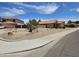 Single Gathering homes featuring desert landscaping in a community with well-maintained streets at 7724 W Topeka W Dr, Glendale, AZ 85308