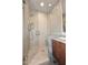 Bathroom features a glass shower with granite countertops and updated fixtures at 8180 E Shea Blvd # 1075, Scottsdale, AZ 85260