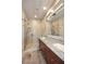 Bathroom features a glass shower with granite countertops and dual sinks at 8180 E Shea Blvd # 1075, Scottsdale, AZ 85260