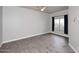 This bedroom has beautiful wood floors and a ceiling fan at 8180 E Shea Blvd # 1075, Scottsdale, AZ 85260