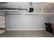 Spacious garage with ample storage, overhead racks, and ready for customization at 8180 E Shea Blvd # 1075, Scottsdale, AZ 85260
