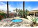 Relaxing community hot tub area, surrounded by mature landscaping and convenient lounge seating at 8180 E Shea Blvd # 1075, Scottsdale, AZ 85260