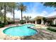 Community pool area featuring lush landscaping, shaded seating, and a perfect spot for relaxation at 8180 E Shea Blvd # 1075, Scottsdale, AZ 85260