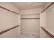 Large walk-in closet with shelving at 8180 E Shea Blvd # 1075, Scottsdale, AZ 85260
