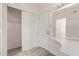 Bathroom featuring a vanity sink, closet and a view to the glass door shower at 8328 E Chaparral Rd, Scottsdale, AZ 85250