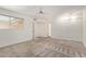 Bright bedroom features a ceiling fan, a carpeted floor and a closet at 8328 E Chaparral Rd, Scottsdale, AZ 85250