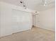 Bedroom with carpet, a ceiling fan, and a closet for organized storage at 8328 E Chaparral Rd, Scottsdale, AZ 85250