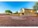 A large backyard featuring a charming fountain, providing a serene and inviting outdoor space for relaxation and activities at 8450 S Stephanie Ln, Tempe, AZ 85284