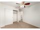 Bedroom with closet, carpet, and interior views at 8450 S Stephanie Ln, Tempe, AZ 85284