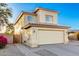 Charming two-story home showcasing a light stucco exterior, tiled roof, and well-maintained landscaping at 8450 S Stephanie Ln, Tempe, AZ 85284