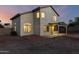 Beautiful two-story home showcasing the backyard with a covered patio, creating an inviting outdoor living space at 8450 S Stephanie Ln, Tempe, AZ 85284
