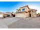 Well-kept home featuring desert landscaping, a two-car garage, and a lovely tile roof at 8450 S Stephanie Ln, Tempe, AZ 85284