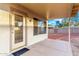 Covered patio area offering shade and relaxation, perfect for enjoying the outdoor scenery and fresh air at 8450 S Stephanie Ln, Tempe, AZ 85284