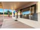 Covered patio area featuring ample space for seating and entertaining with a view of the backyard at 8450 S Stephanie Ln, Tempe, AZ 85284