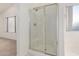 Bathroom shower with glass doors and bright natural light at 8450 S Stephanie Ln, Tempe, AZ 85284