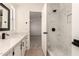 Bright bathroom featuring a tiled shower, black hardware, and stylish finishes at 8500 E Southern Ave # 550, Mesa, AZ 85209