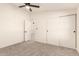 Bedroom with carpet, ceiling fan, closet and ample lighting at 8500 E Southern Ave # 550, Mesa, AZ 85209