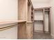 Custom closet with shelving, drawers, and hanging rods for organizing clothes and accessories at 8500 E Southern Ave # 550, Mesa, AZ 85209