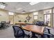 Bright game room with card tables, comfortable seating, and natural light creates a welcoming space at 8500 E Southern Ave # 550, Mesa, AZ 85209
