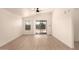Bright living area with a vaulted ceiling, a ceiling fan, and sliding glass doors leading outside at 8500 E Southern Ave # 550, Mesa, AZ 85209