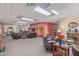 Cozy lounge area with comfortable seating, a fireplace, and warm lighting at 8500 E Southern Ave # 550, Mesa, AZ 85209