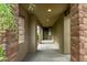 Inviting entryway with a modern design leading to the front door at 9222 W Roma Ave, Phoenix, AZ 85037
