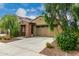 Beautiful single-story home showcasing desert landscaping and a convenient two-car garage at 9222 W Roma Ave, Phoenix, AZ 85037