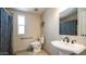 Cozy bathroom with accessible features, modern fixtures, and neutral tones at 9431 E Coralbell Ave # 6, Mesa, AZ 85208