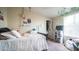Cozy bedroom featuring natural light, soft textures and decor, creating a relaxing atmosphere at 9431 E Coralbell Ave # 6, Mesa, AZ 85208