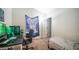 Neutral-toned room with desk and bed, offering versatile space for work or relaxation at 9431 E Coralbell Ave # 6, Mesa, AZ 85208