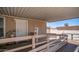 Home exterior featuring an access ramp, storage shed, and covered parking at 9431 E Coralbell Ave # 6, Mesa, AZ 85208