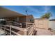 Home featuring an access ramp, storage shed, and covered parking at 9431 E Coralbell Ave # 6, Mesa, AZ 85208
