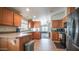 Well-lit kitchen with ample cabinetry, modern appliances, and tile flooring at 9431 E Coralbell Ave # 6, Mesa, AZ 85208