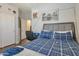 Modern bedroom features wood floors and ample light at 9948 W Chipman Rd, Tolleson, AZ 85353
