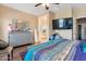 Bright bedroom with a view to a bath at 9948 W Chipman Rd, Tolleson, AZ 85353