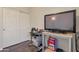 Small bedroom with closet and TV at 9948 W Chipman Rd, Tolleson, AZ 85353
