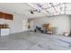 Spacious two car garage, offering ample storage and parking space at 9948 W Chipman Rd, Tolleson, AZ 85353