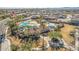 Aerial view of community pool and recreation area featuring pools, shade structures, and desert landscaping at 1008 W Heatherwood St, San Tan Valley, AZ 85140