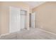 Bedroom featuring an open sliding door closet at 1008 W Heatherwood St, San Tan Valley, AZ 85140
