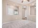 Comfortable bonus room with neutral walls, carpet, and open layout at 1008 W Heatherwood St, San Tan Valley, AZ 85140