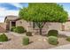 Charming single-story home features a well-maintained yard with attractive landscaping and a two-car garage at 1008 W Heatherwood St, San Tan Valley, AZ 85140