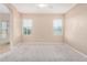 Spacious bedroom featuring carpet and natural light at 1008 W Heatherwood St, San Tan Valley, AZ 85140