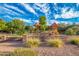 Exterior of the community playground with two orange shades and green trees around at 1008 W Heatherwood St, San Tan Valley, AZ 85140