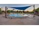 Community splash pad featuring a blue sun shade and various water features for  at 1008 W Heatherwood St, San Tan Valley, AZ 85140