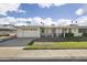 Charming single-story home featuring a well-maintained lawn, two-car garage, and inviting curb appeal at 10222 N 105Th Dr, Sun City, AZ 85351