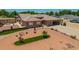 Expansive home featuring meticulous xeriscaping and a spacious two-car garage, enhancing curb appeal at 10535 W San Miguel Ave, Glendale, AZ 85307