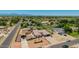 Wide aerial view of a single-Gathering home with a manicured front yard and convenient driveway parking at 10535 W San Miguel Ave, Glendale, AZ 85307